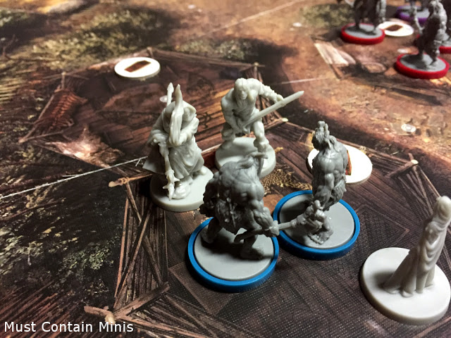 Miniatures fighting in Conan by Monolith Games