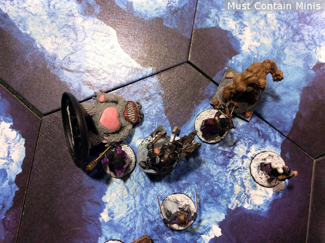 The Templar and Captain take out a monster in Frostgrave