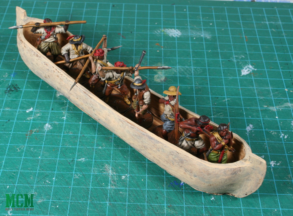 A Loaded Canoa for Blood and Plunder can hold 8 miniatures 