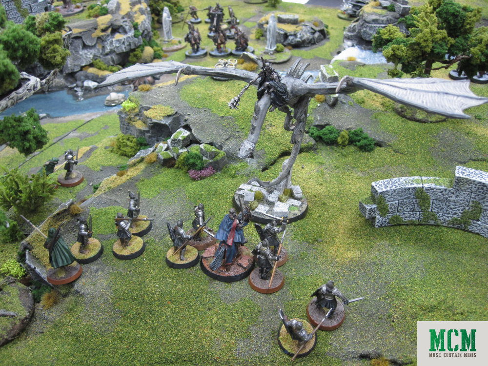 Ringwraith™ on a Fell Beast takes on many soldiers at once. 28mm tabletop gaming.