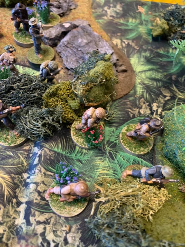 A play test image of troops moving trough the jungle. 