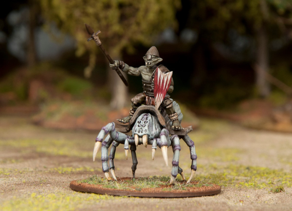 A 28mm miniature goblin rider on top of a spider.