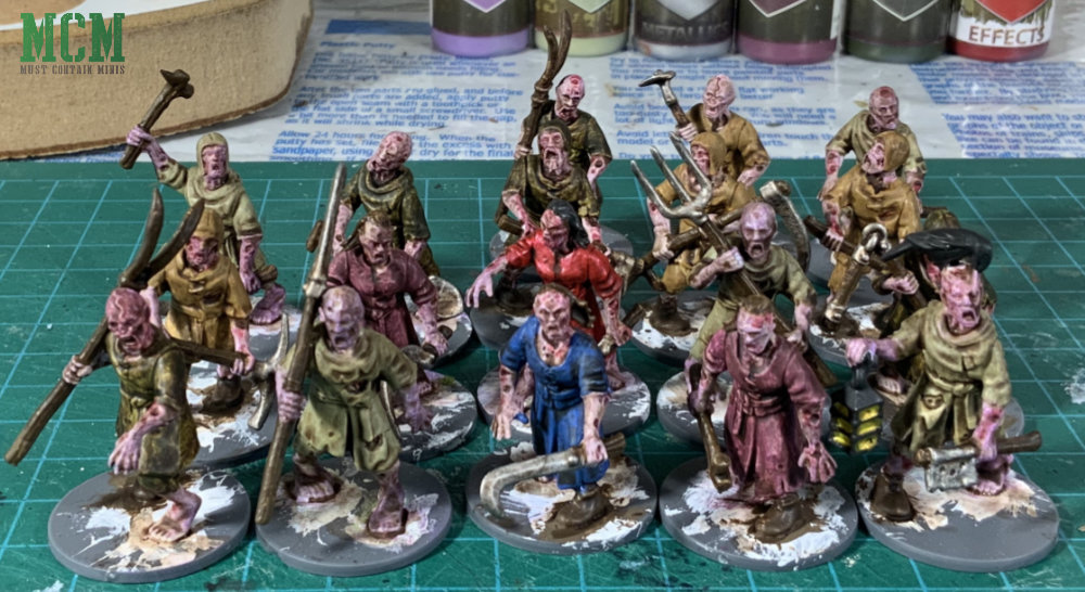 28mm Village Zombies for fantasy games painted and shaded up. Miniatures from Fireforge Games for Forgotten World.