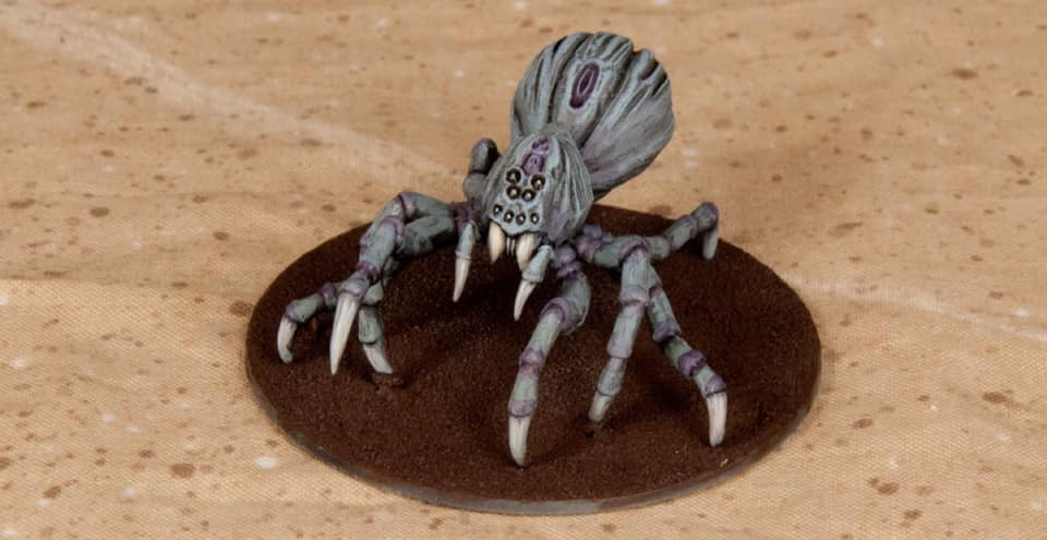 A prototype miniature spider on a 28mm base.