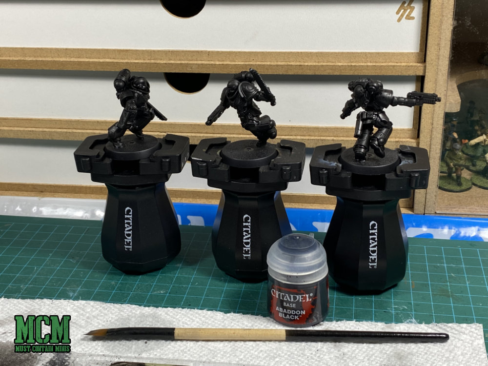 How to Paint Miniatures. Brush on Abaddon Black Citadel Paint if you don't have spray primer. It works just the same.