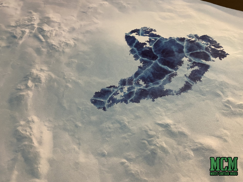 Frozen pond or lake printed on a miniature gaming mat