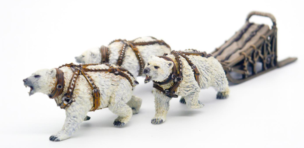 Miniature dog sled pulled by polar bears