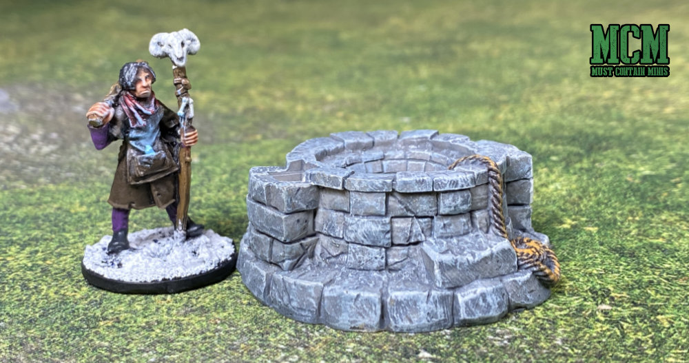 A Well with a 28mm Miniature - Scatter terrain review for miniature wargaming 