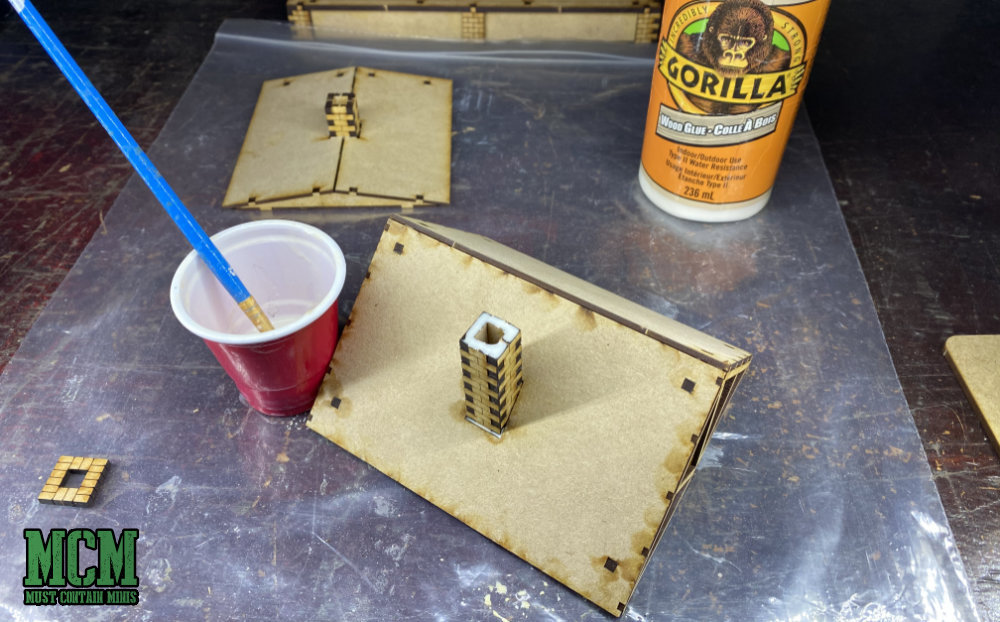 I like to use Gorilla Glue for my projects and use a brush to apply it to the models. 