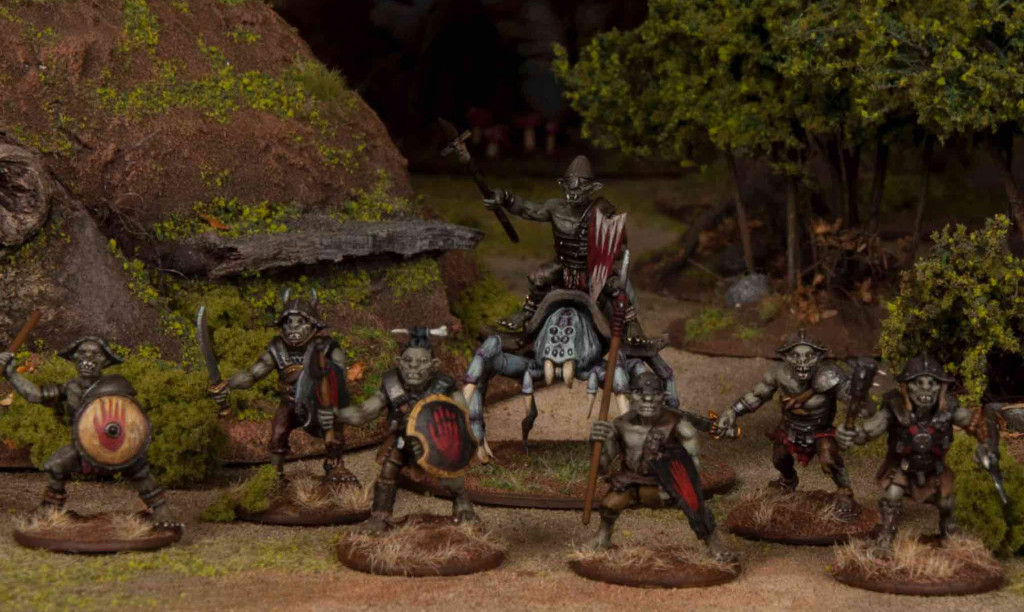 A spider rider and goblin warband.