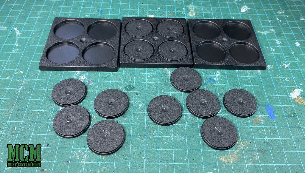 Bases and movement trays for Conquest