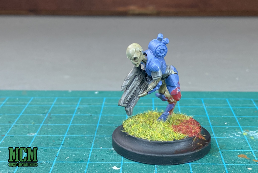 An alien miniature missing a limb that I saved with blood effects - The Army Painter