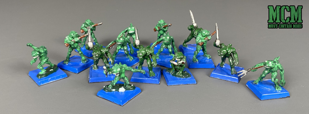 A group of 28mm Deep Ones miniatures