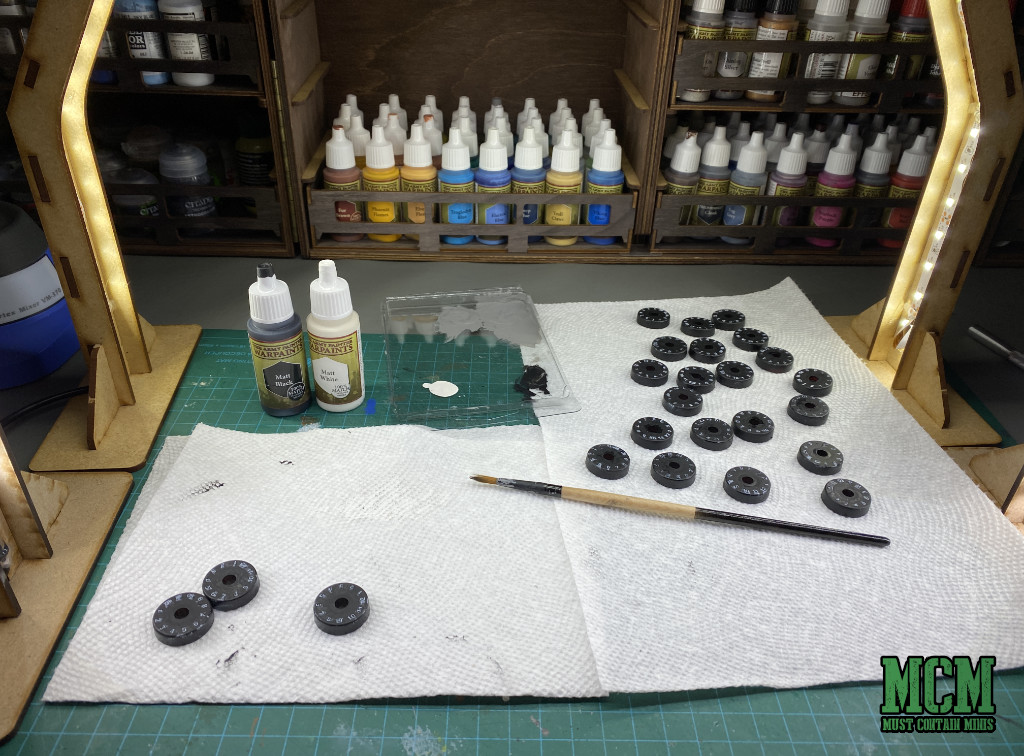 Tutorial on How to Paint Bolt Action Pin Markers - clean up the bases