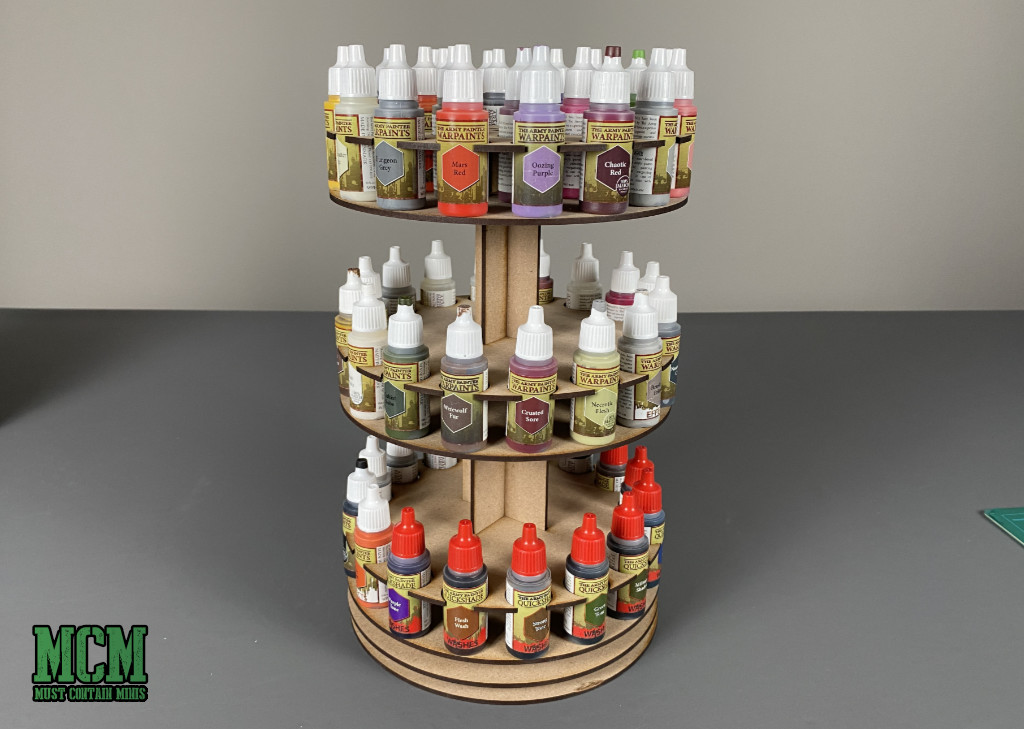 A Game Craft Miniatures Rotating Paint Rack full of The Army Painter Paints 
