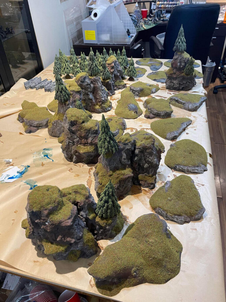 Table full of 3D printed terrain