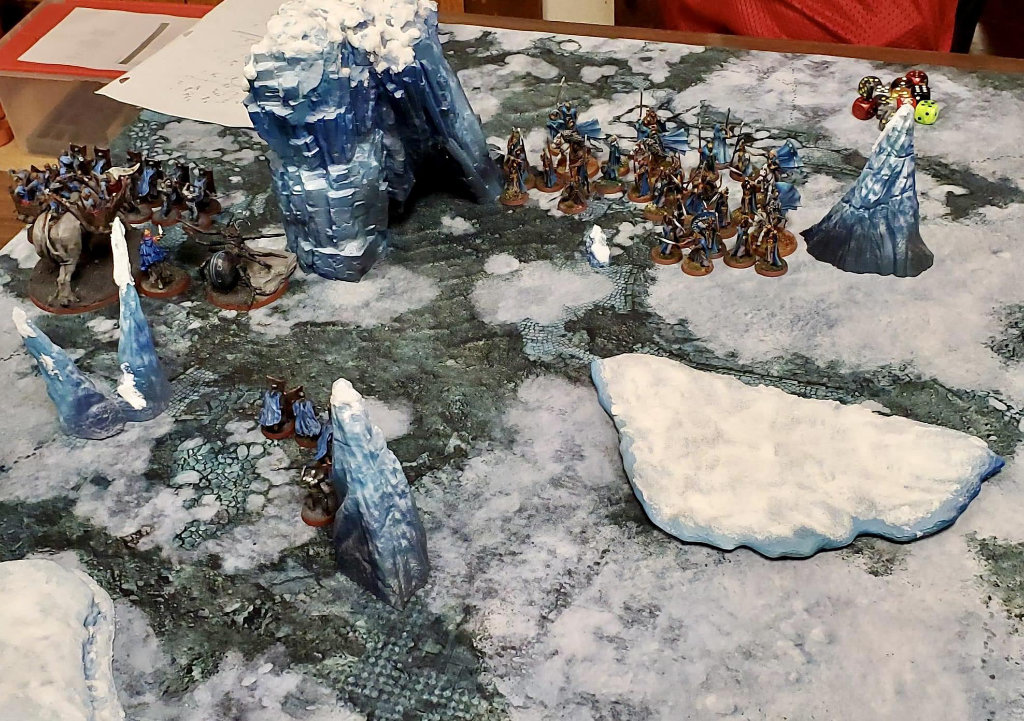 Gaming on a snow and ice gaming mat with 3D printed terrain