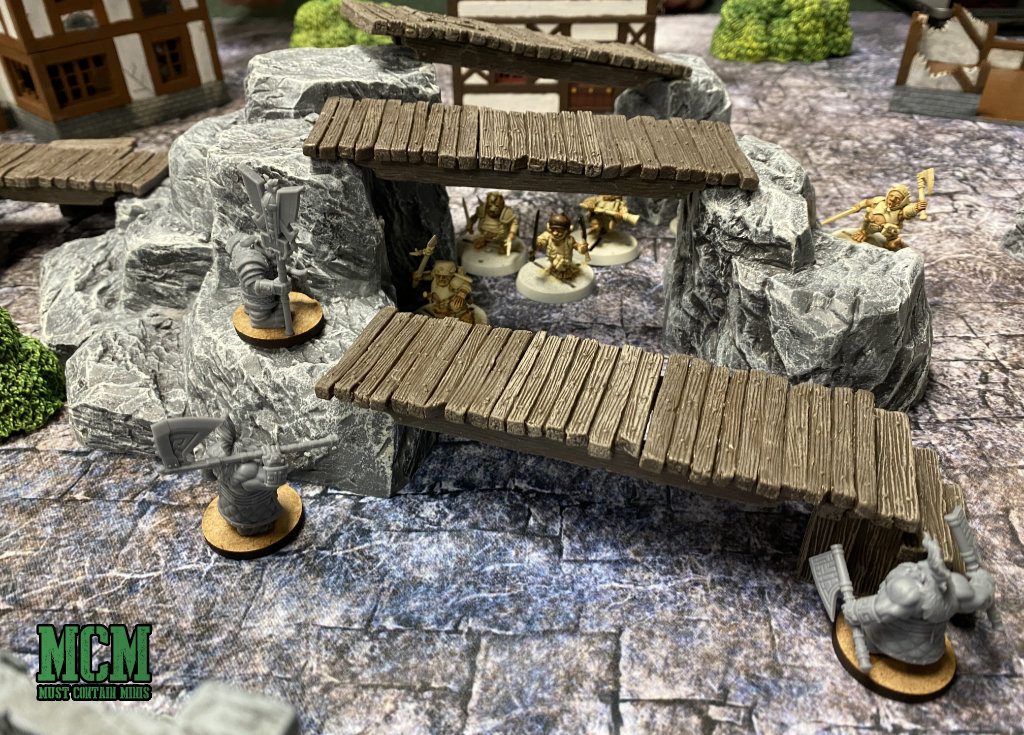 Monster Fight Club Terrain on a Cigar Box Battle Mat - many halflings take on a handful of dwarfs. 