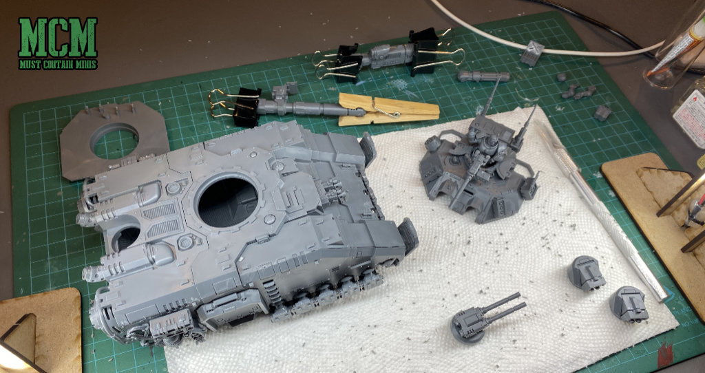 Clamping the Space Marine Primaris Repulsor Executioner parts together to make the build easier. 